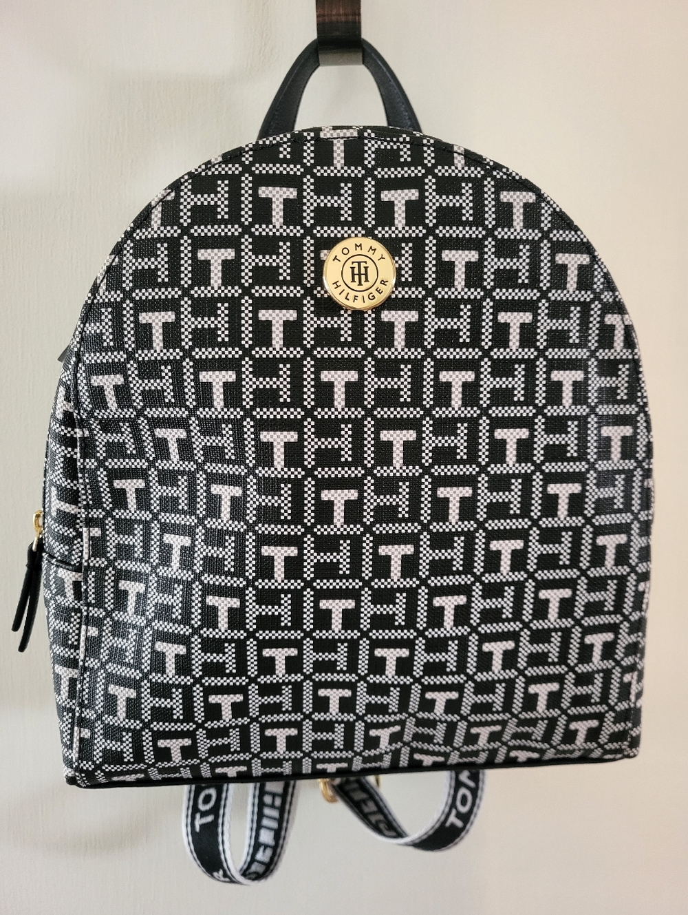 Tommy Hilfiger Black & White Monogram Dome Backpack With Canvas Straps.